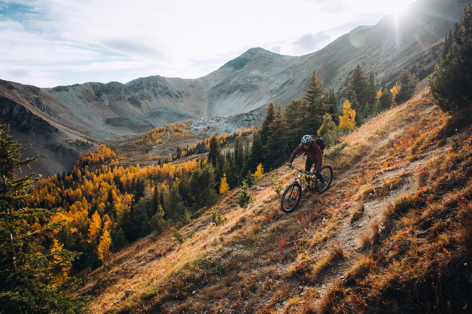 Sam Schultz riding his Instinct on a singletrack