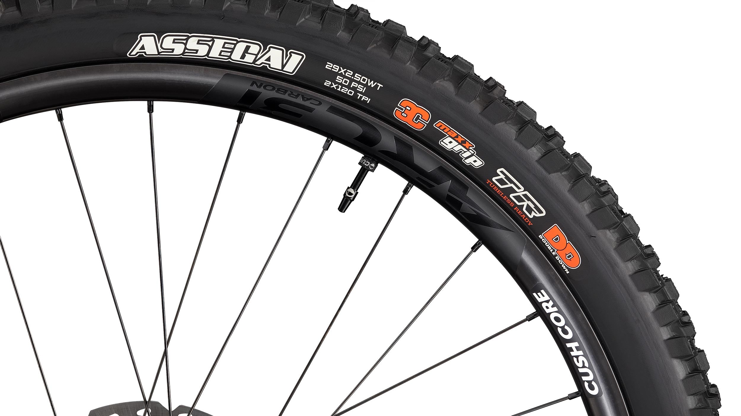 _caption_Experience the ultimate combination of strength, agility, and protection with the RaceFace ARC carbon rims. When equipped with Maxxis DoubleDown tires and CushCore XC tire inserts, you'll enjoy enhanced traction, superior support, and unmatched responsiveness.